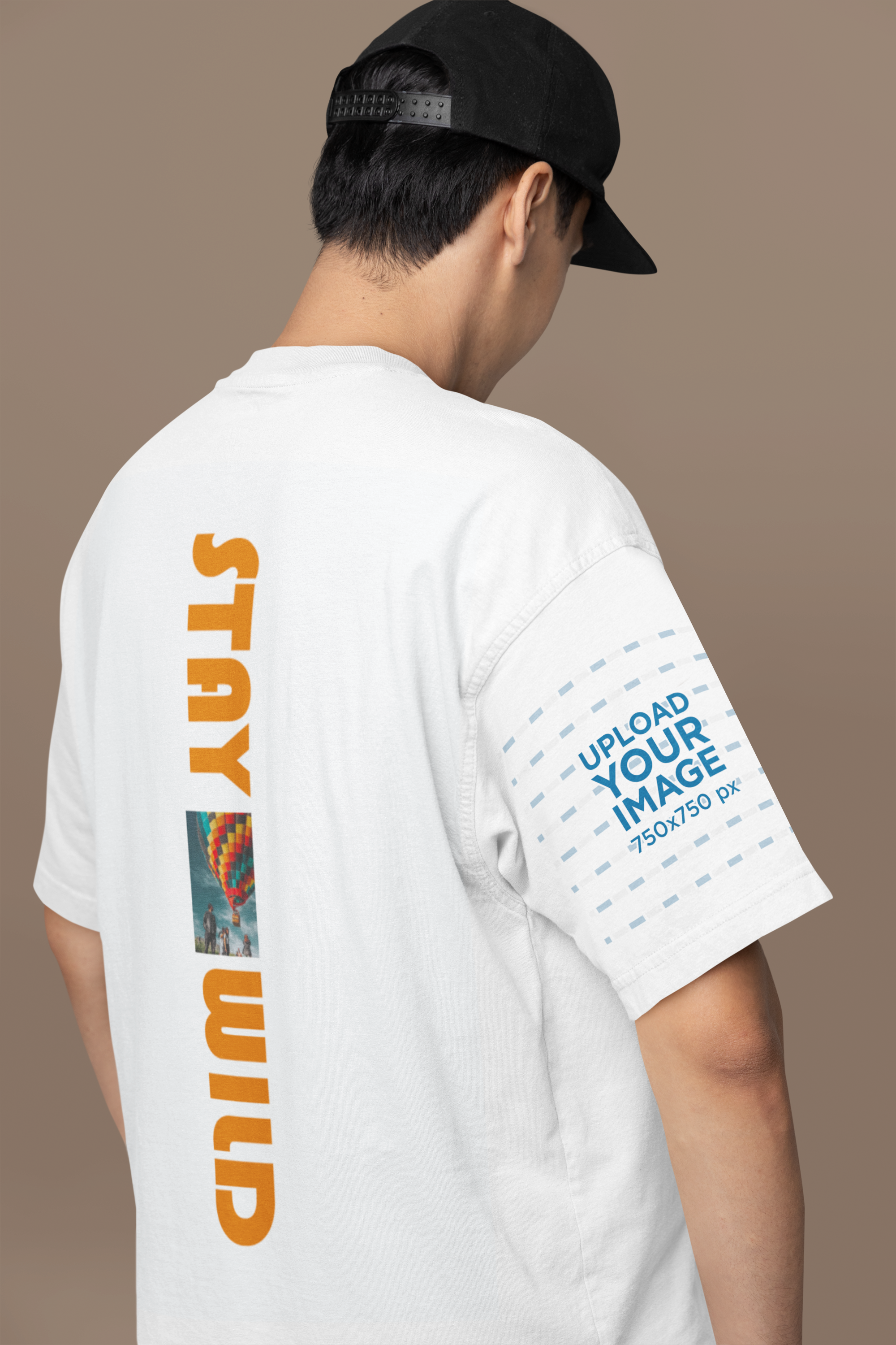 back-view-mockup-of-a-man-wearing-an-oversized-t-shirt-in-a-studio-m38929